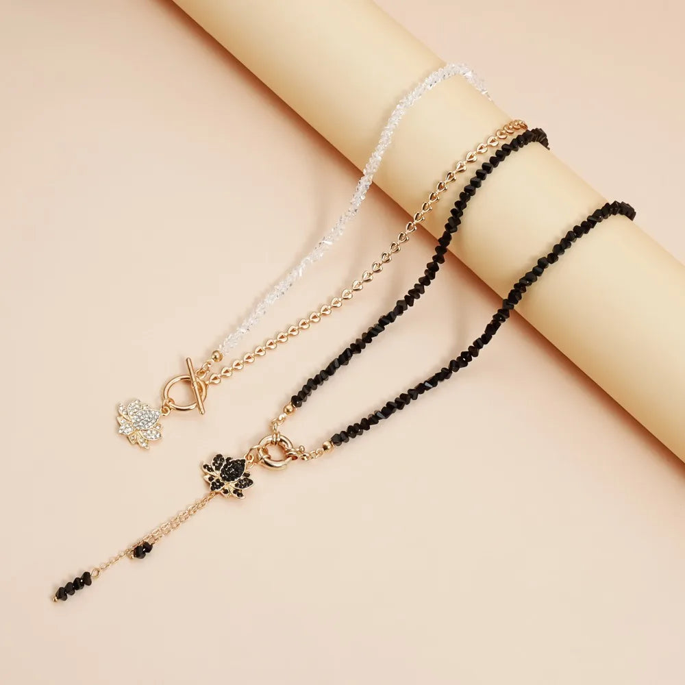 Collier Pendentif Lotus Strass et Pompon - Perles Cristal Noir Triangulaire Femme