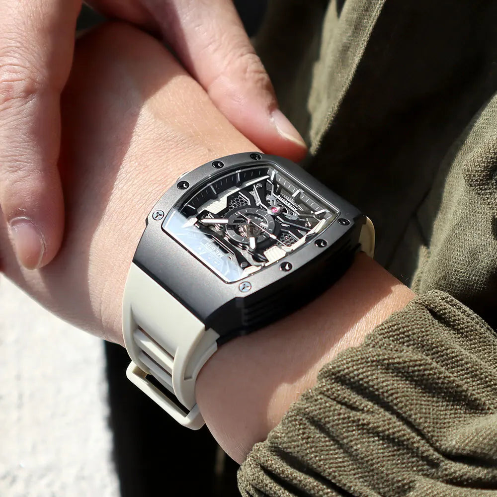 MEGIR - Montre Homme MEGIR 8604 Mécanique Automatique Squelette - Boîtier Tonneau Acier - Bracelet Silicone